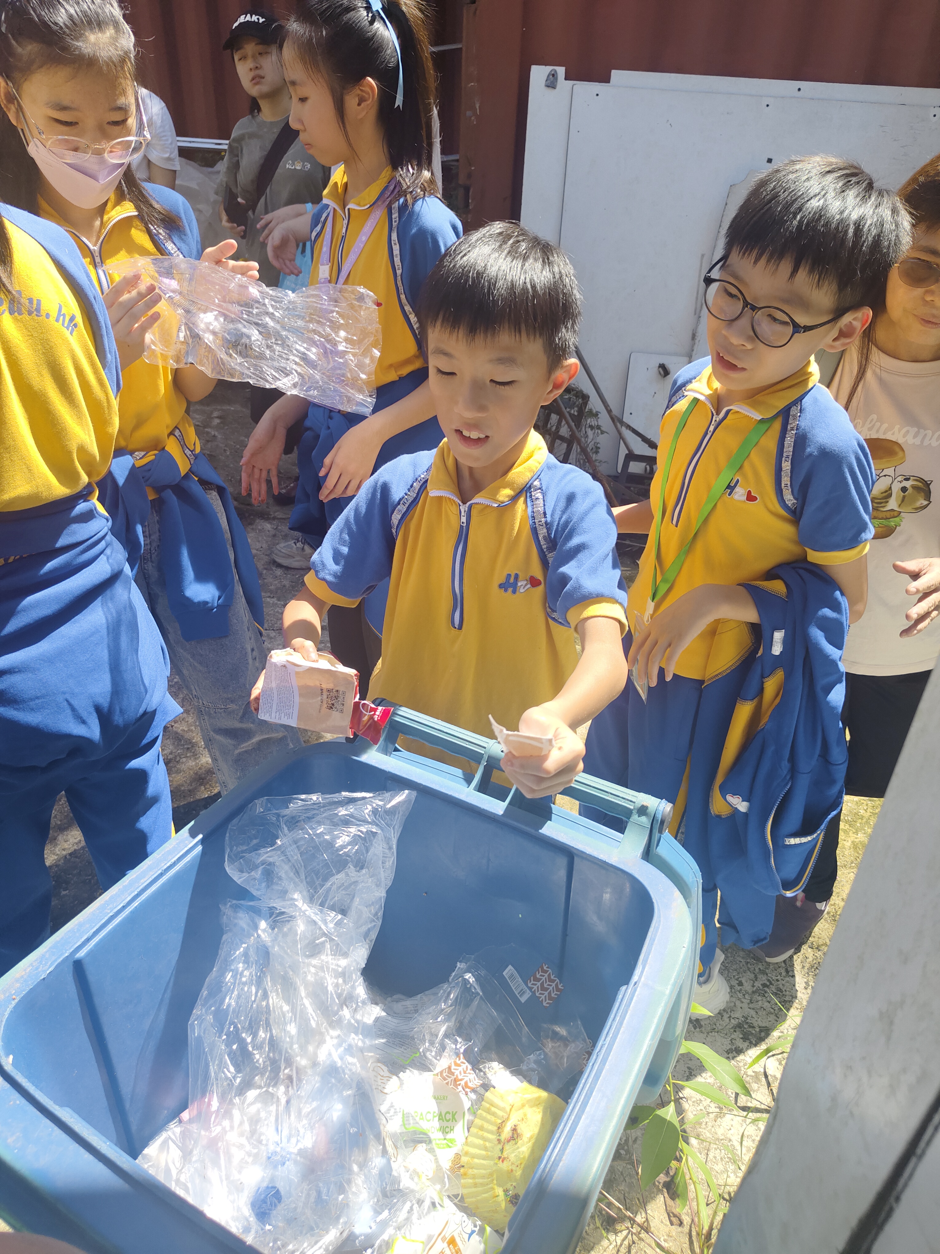 Student sorting food waste